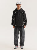 Black jacket — front view with the zip closed and curved sleeve panels visible