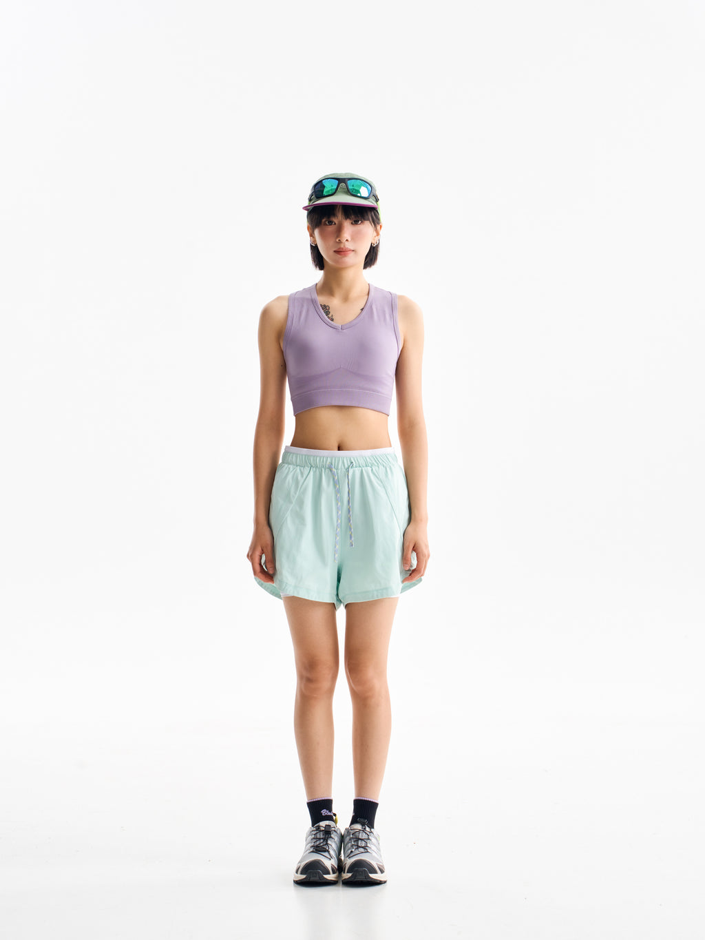 Green hiking shorts — front view showing the drawcord waist and relaxed leg shape