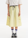 Yellow hiking capri pants — front view with a dark drawcord and wide cropped legs
