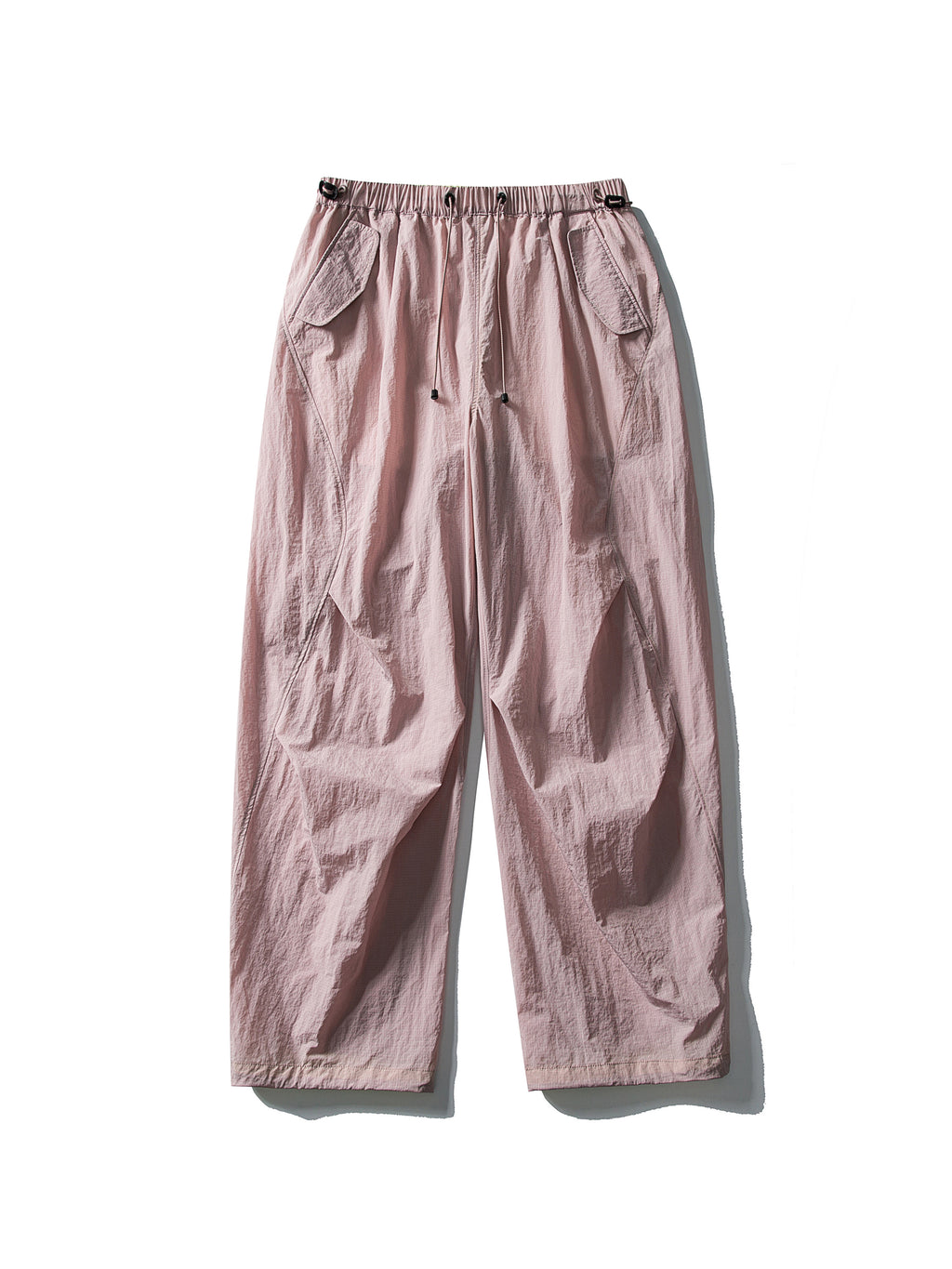 Pink hiking pants — flat front view showing the waist cords and open hems