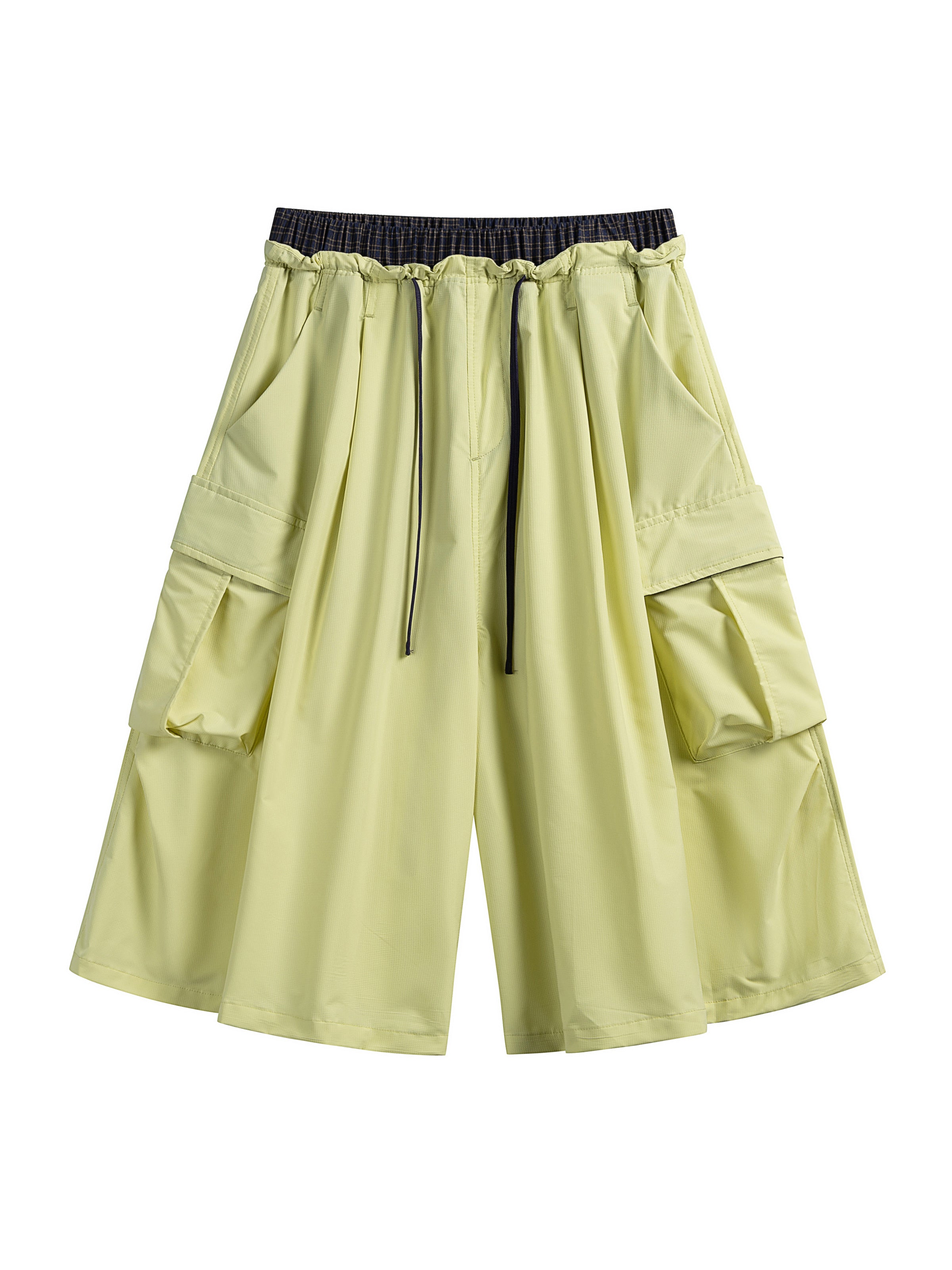 Yellow hiking capri pants — flat front view showing the contrast waistband and long drawcord
