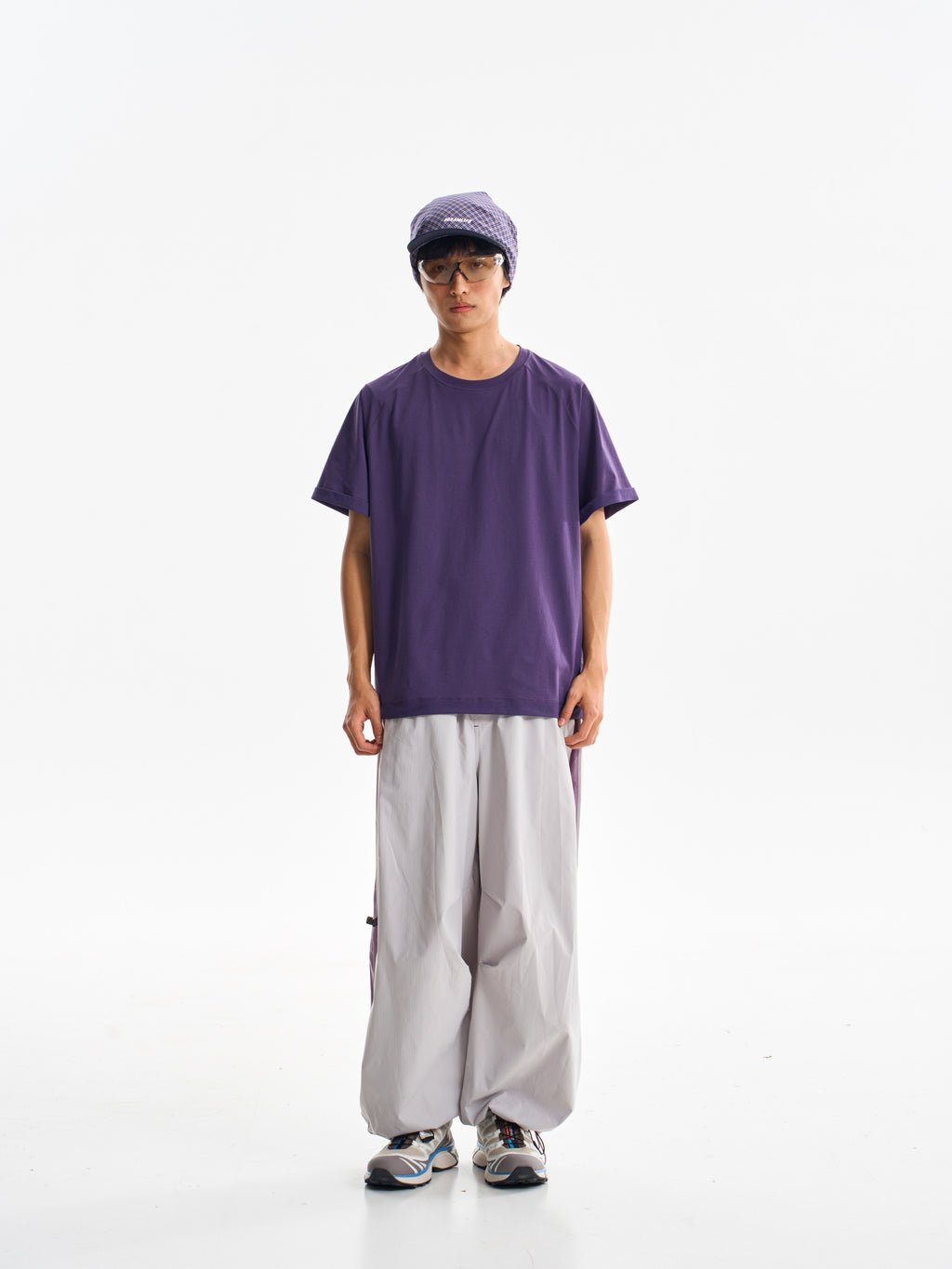 Light Gray hiking pants — full-length front view with a plain purple shirt
