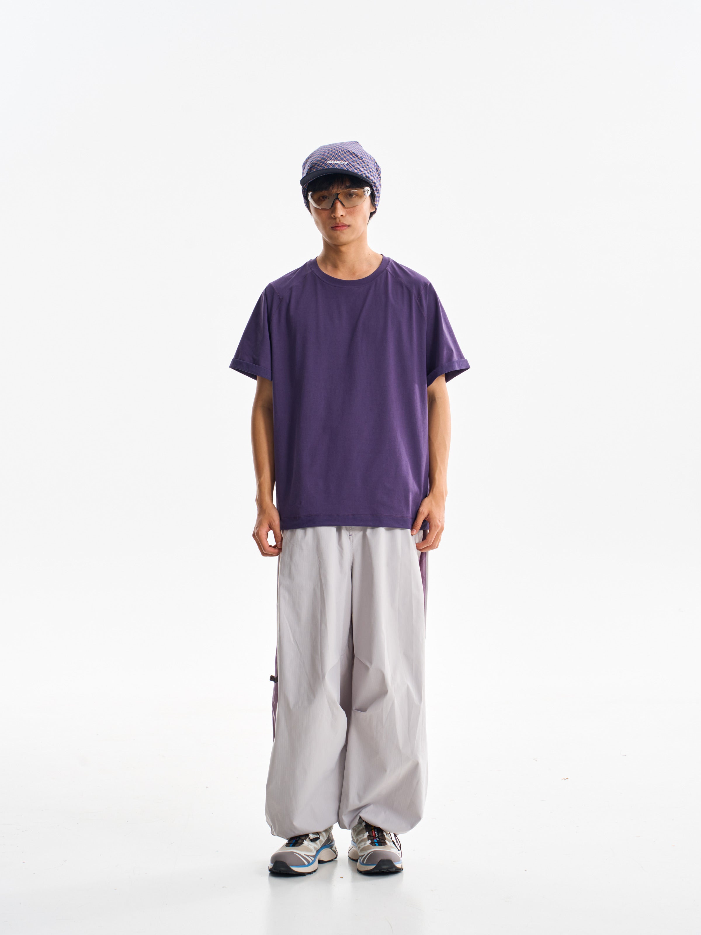 Light Gray hiking pants — full-length front view with a plain purple shirt