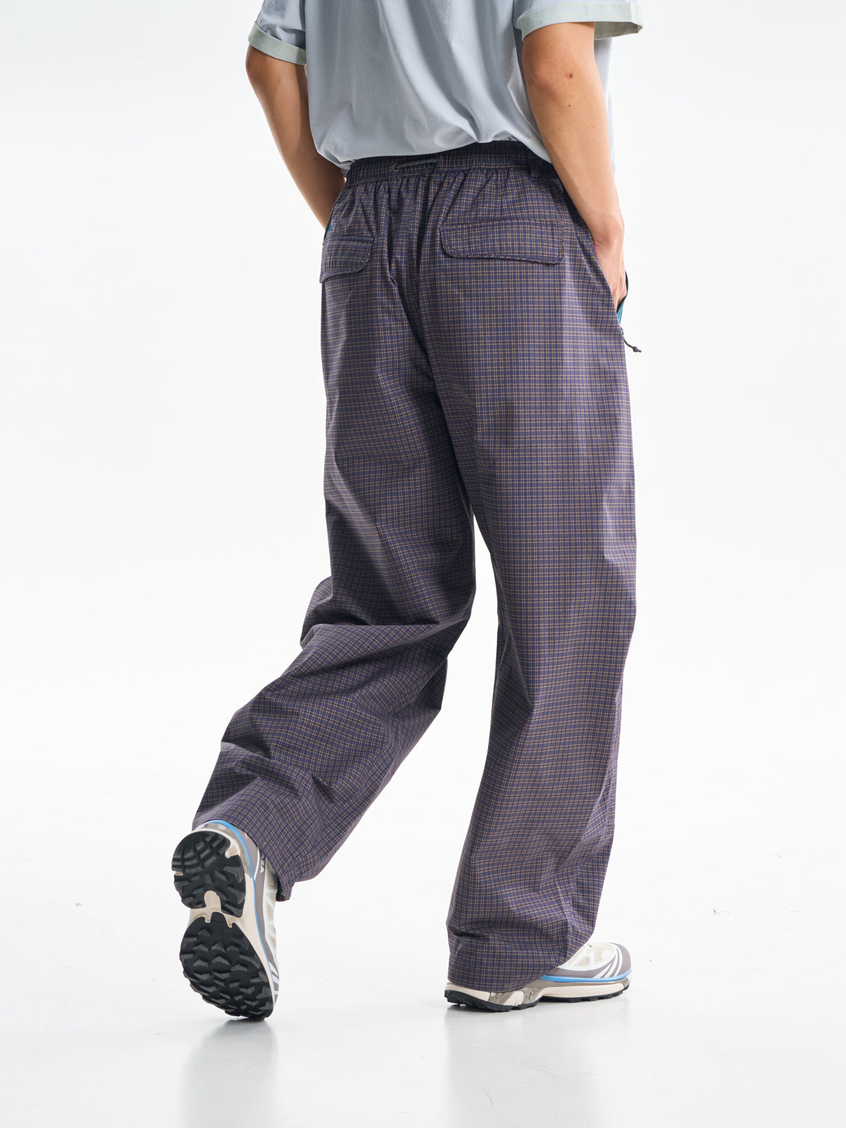 Slate Purple hiking cargo pants — rear view showing the back pockets and leg shape