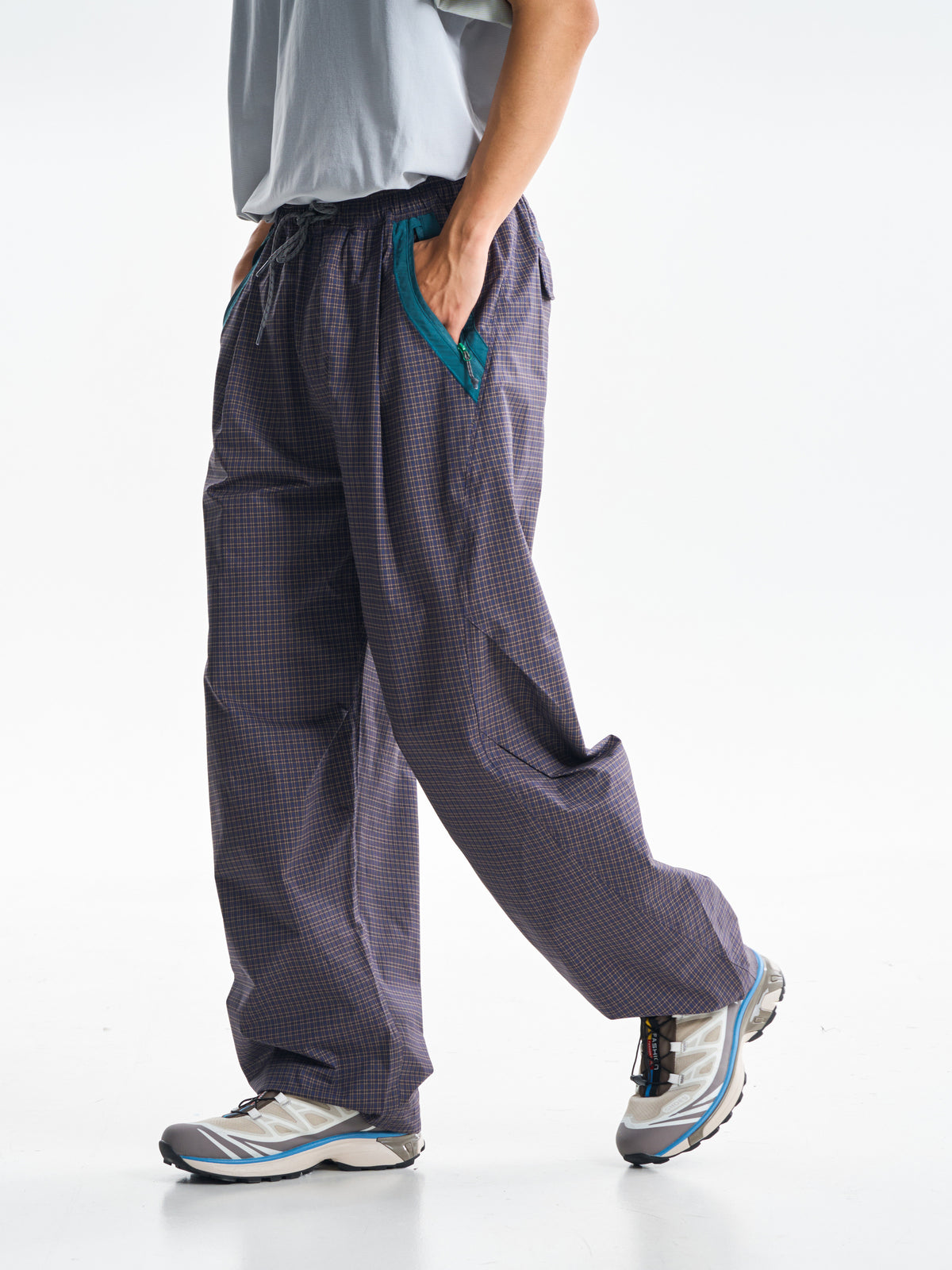 Slate Purple hiking cargo pants — side view showing the curved leg profile