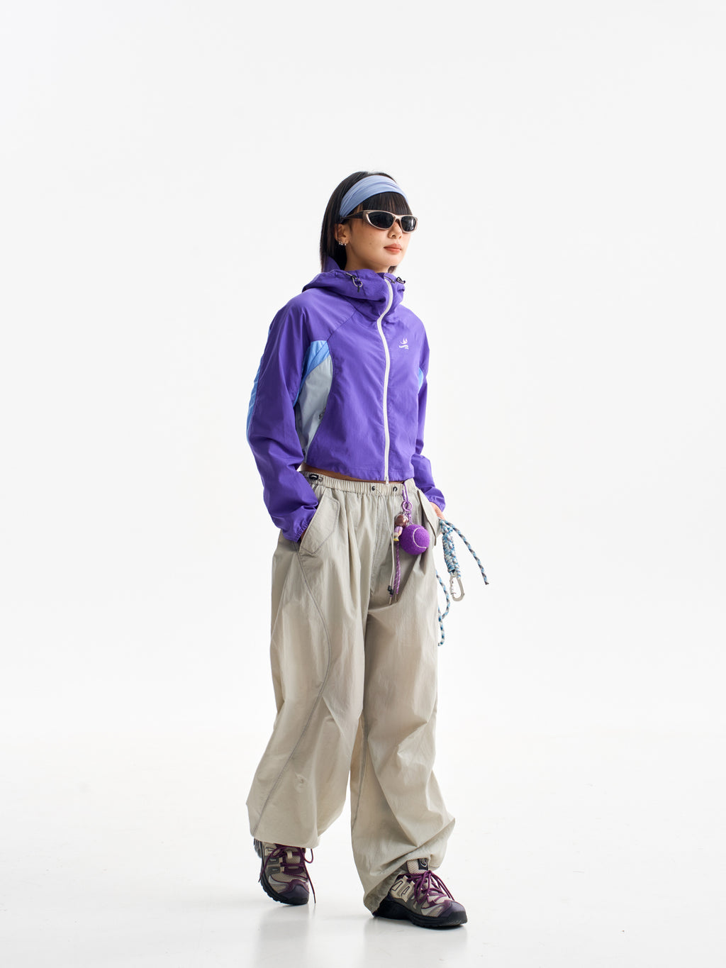 Light Gray hiking pants — side stride showing the loose fit and ankle gathers