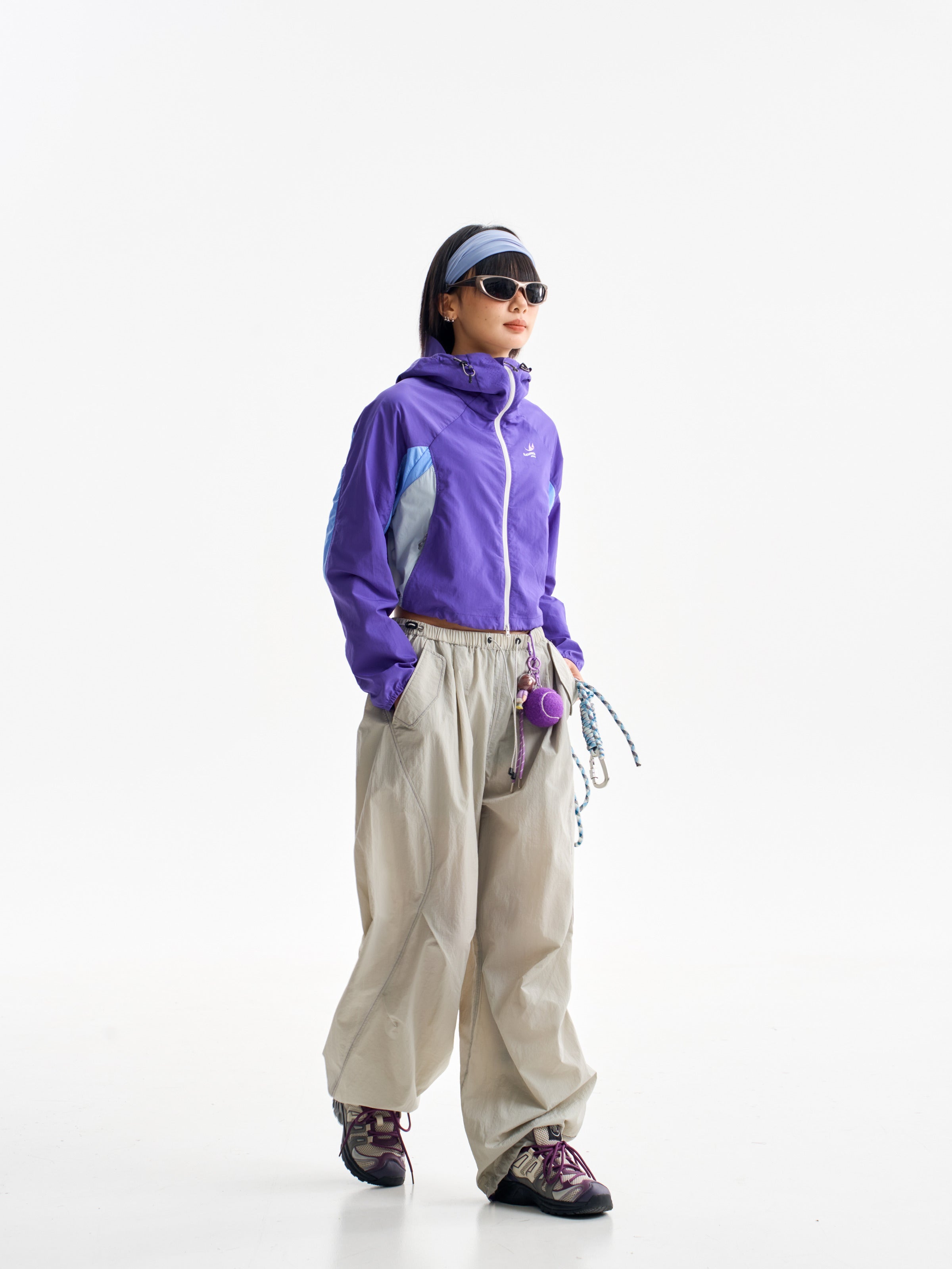 Light Gray hiking pants — side stride showing the loose fit and ankle gathers