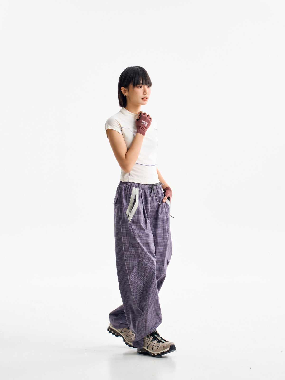 Cardamom Purple hiking cargo pants — side view showing the curved leg profile