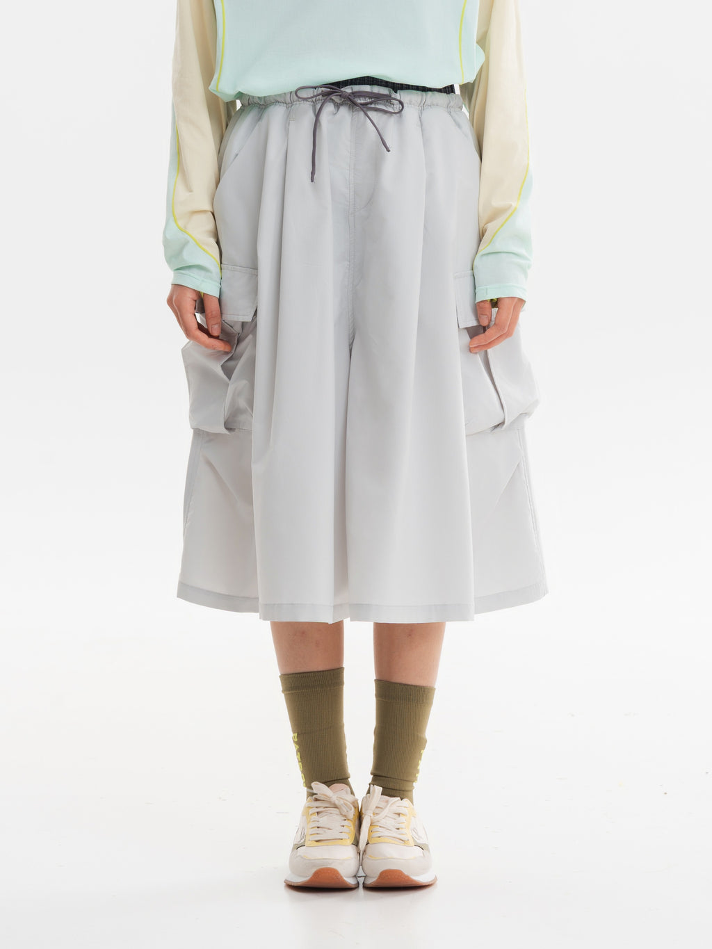 Light Gray hiking capri pants — front view showing the contrast waistband and paired cargo pockets