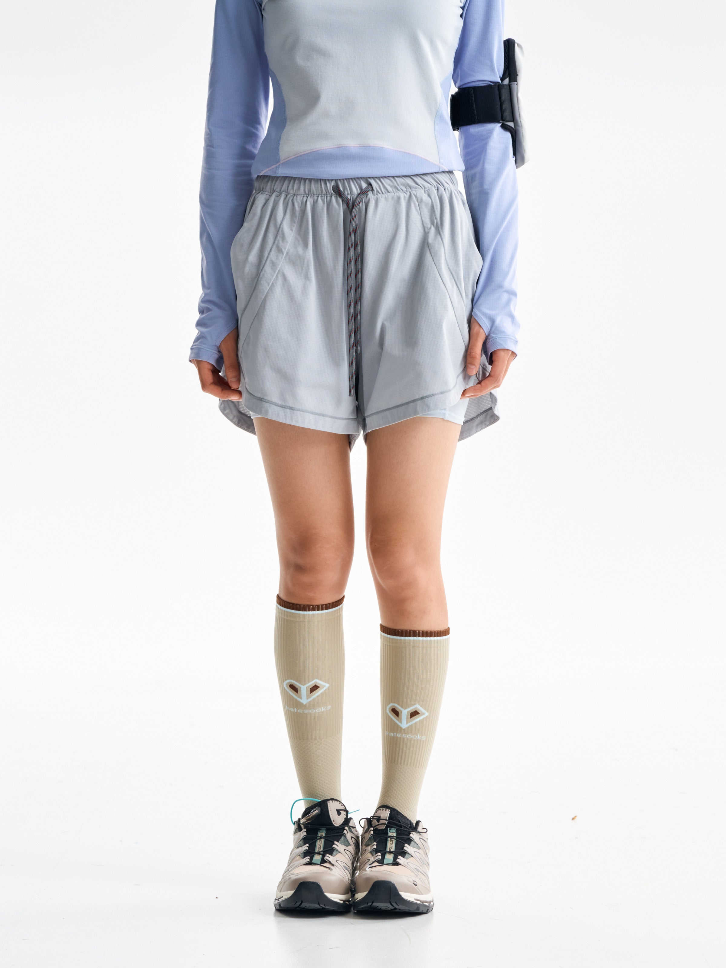 Light Gray hiking shorts — front view showing the drawcord waist and curved side panels