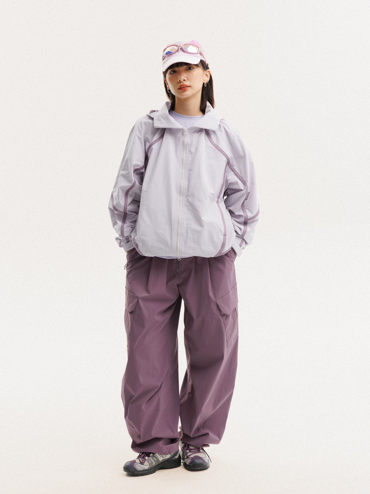 Purple Pink jacket — front view with the zip closed and curved sleeve panels visible