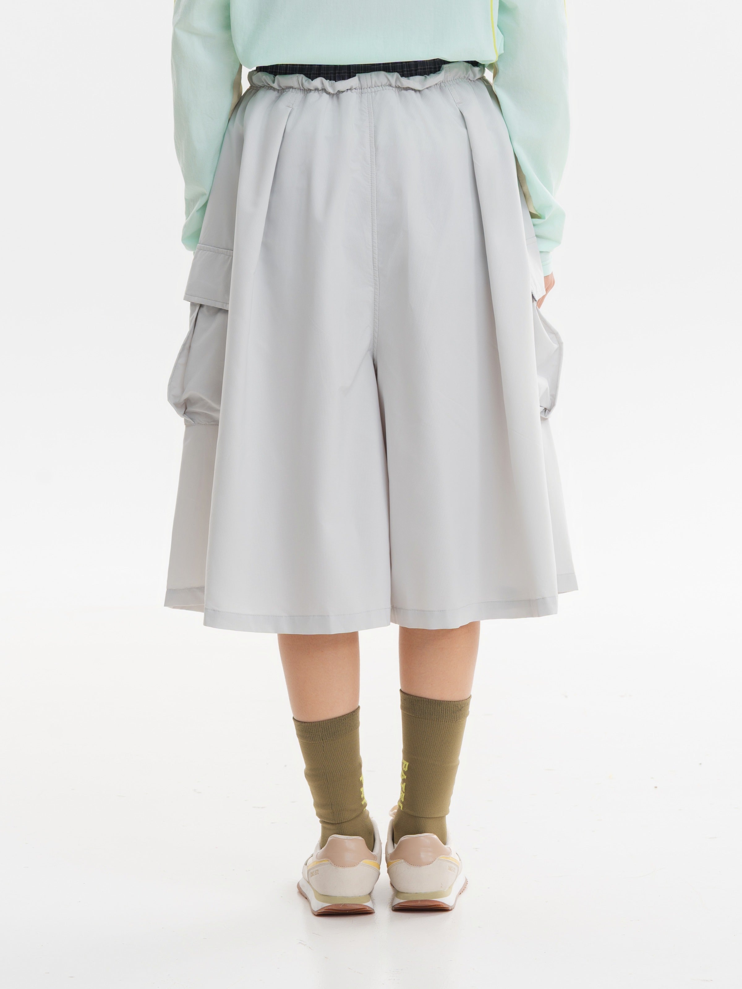 Light Gray hiking capri pants — straight back view showing the gathered waistband and leg shape