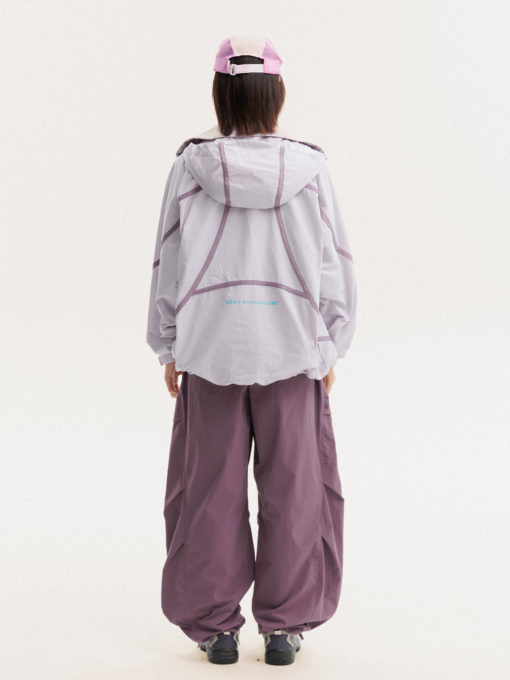 Purple Pink jacket — rear view showing the hood and curved back seams