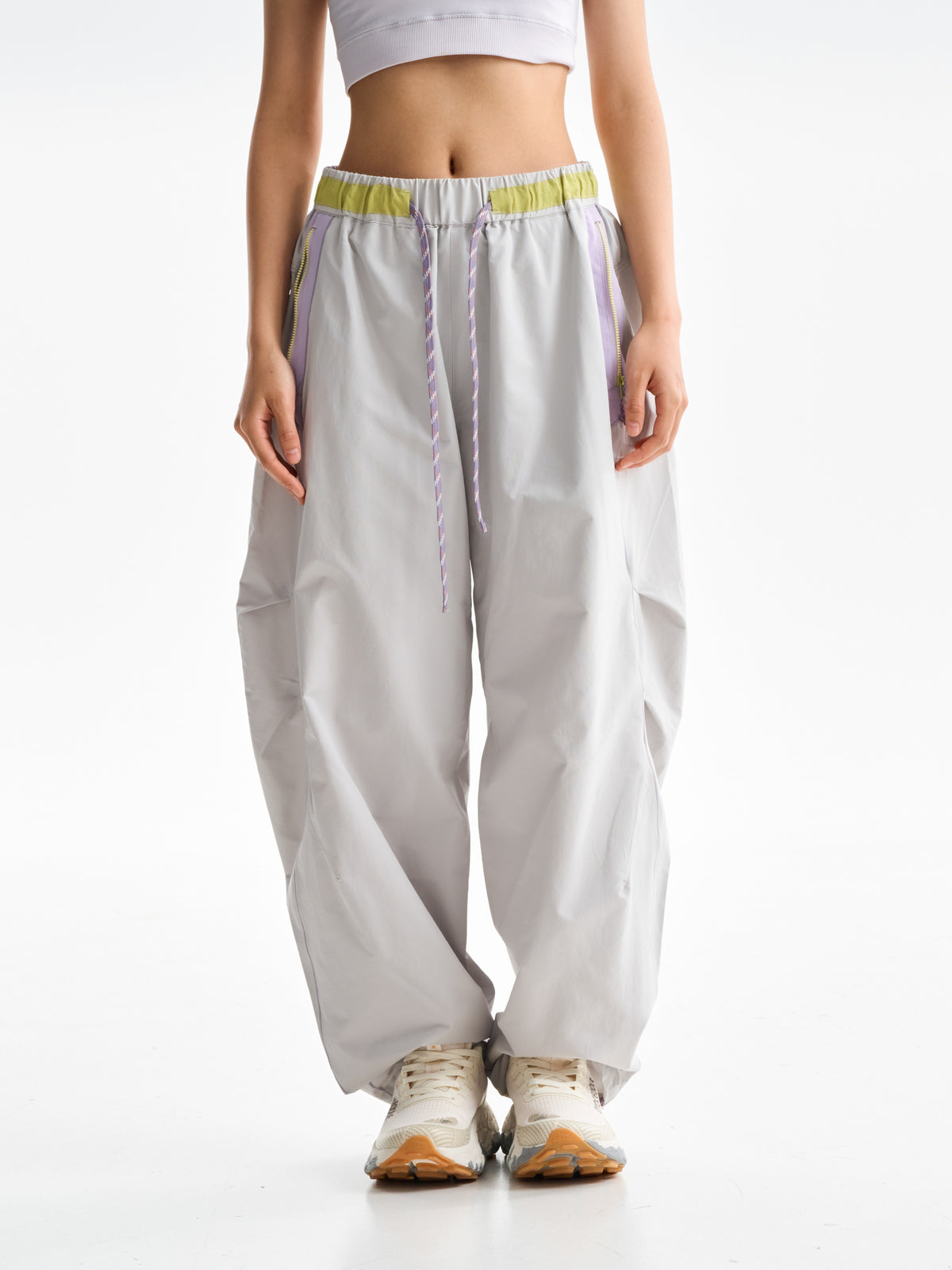 Light Gray hiking pants — front view showing the curved legs and gathered hems