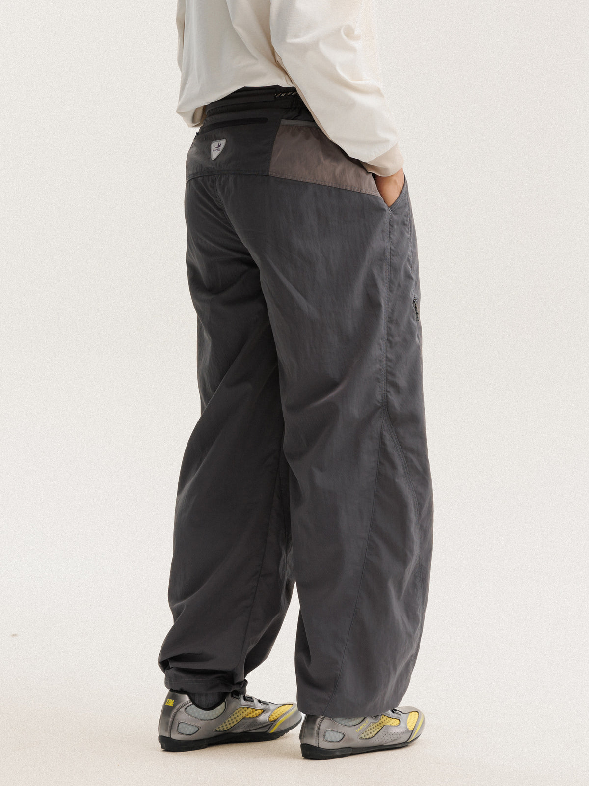 Dark Gray hiking pants — turned back view showing the contrast rear waist panel