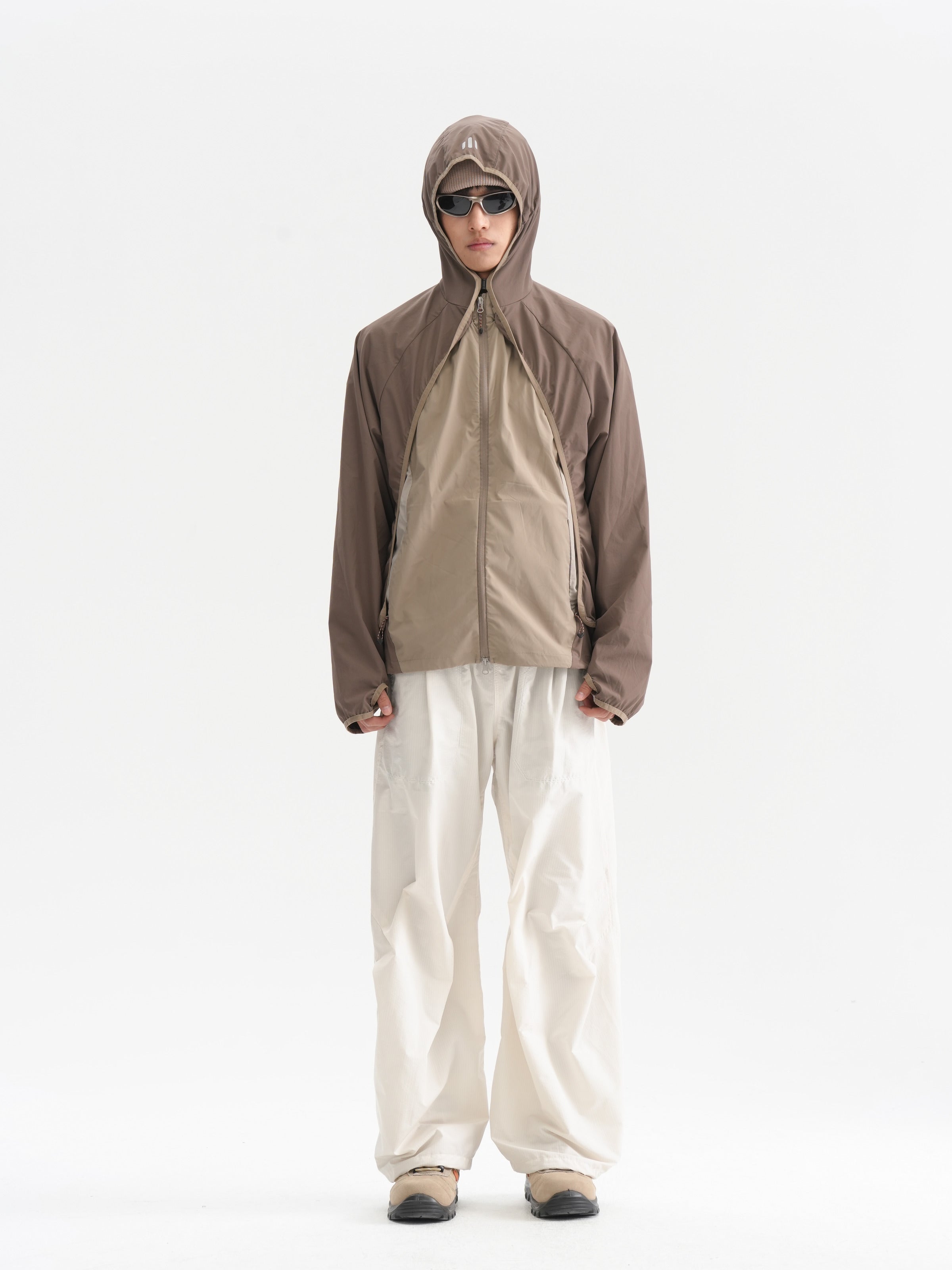 Brown jacket — front view showing the two-layer construction and full length