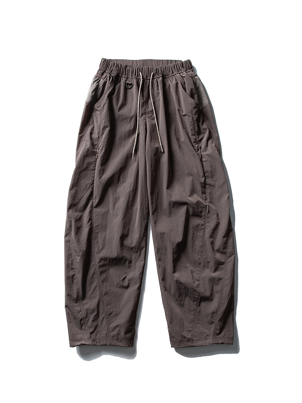 Purple hiking pants — flat front view showing the side pockets and straight hems