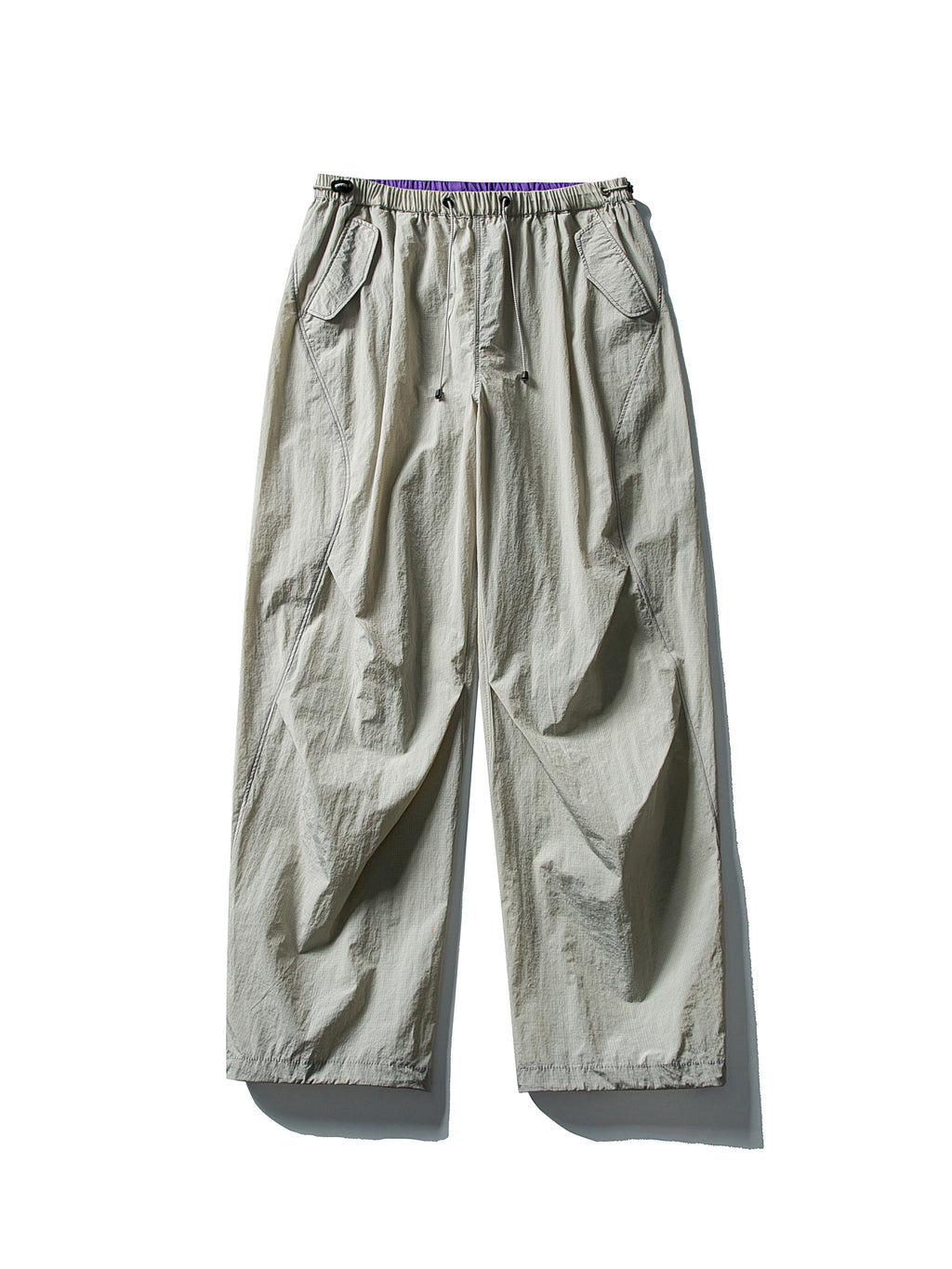 Light Gray hiking pants — flat front view showing the pale shell and violet waist edge