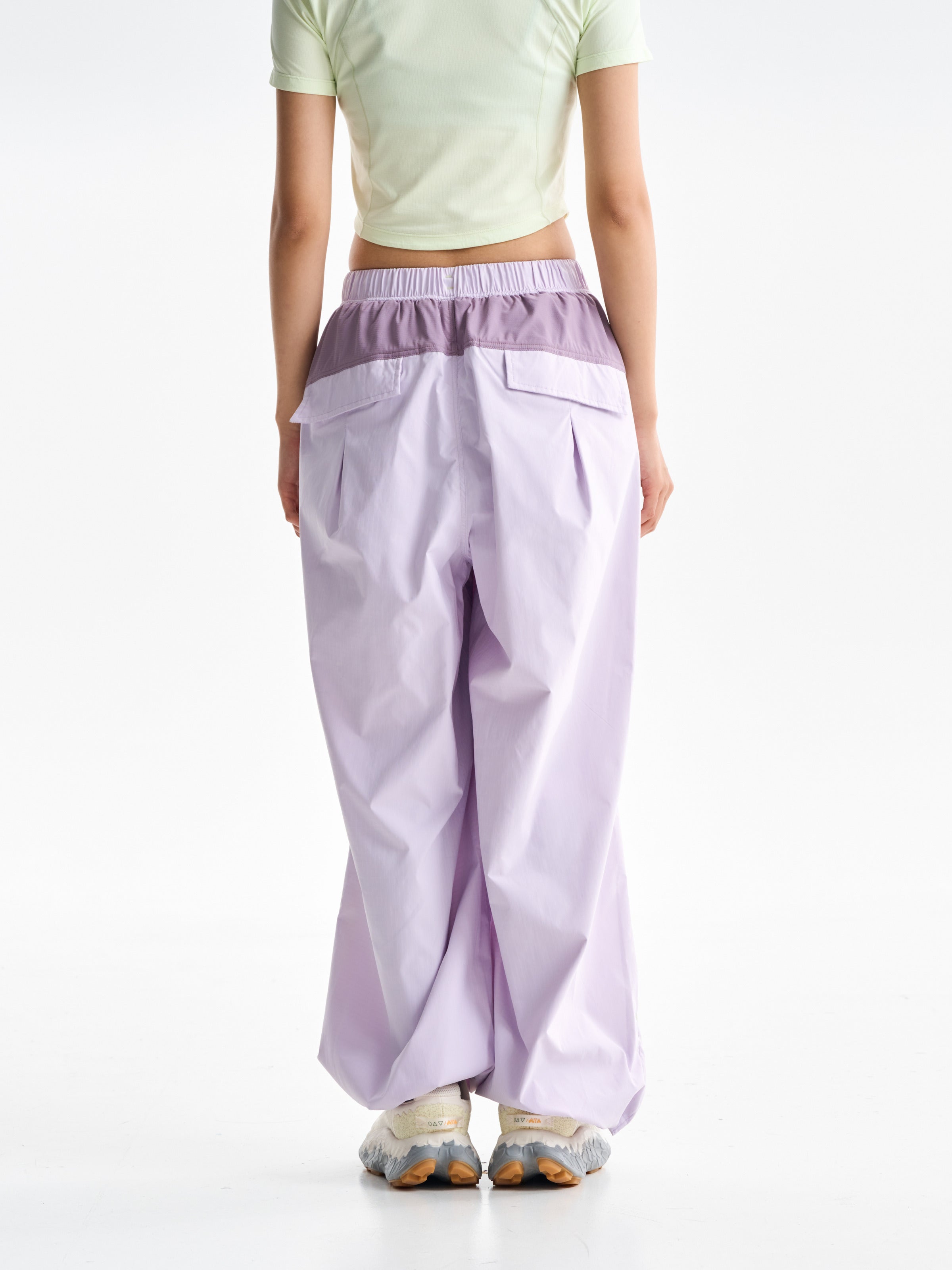 Purple Pink hiking pants — rear view showing the contrast yoke and flap pockets