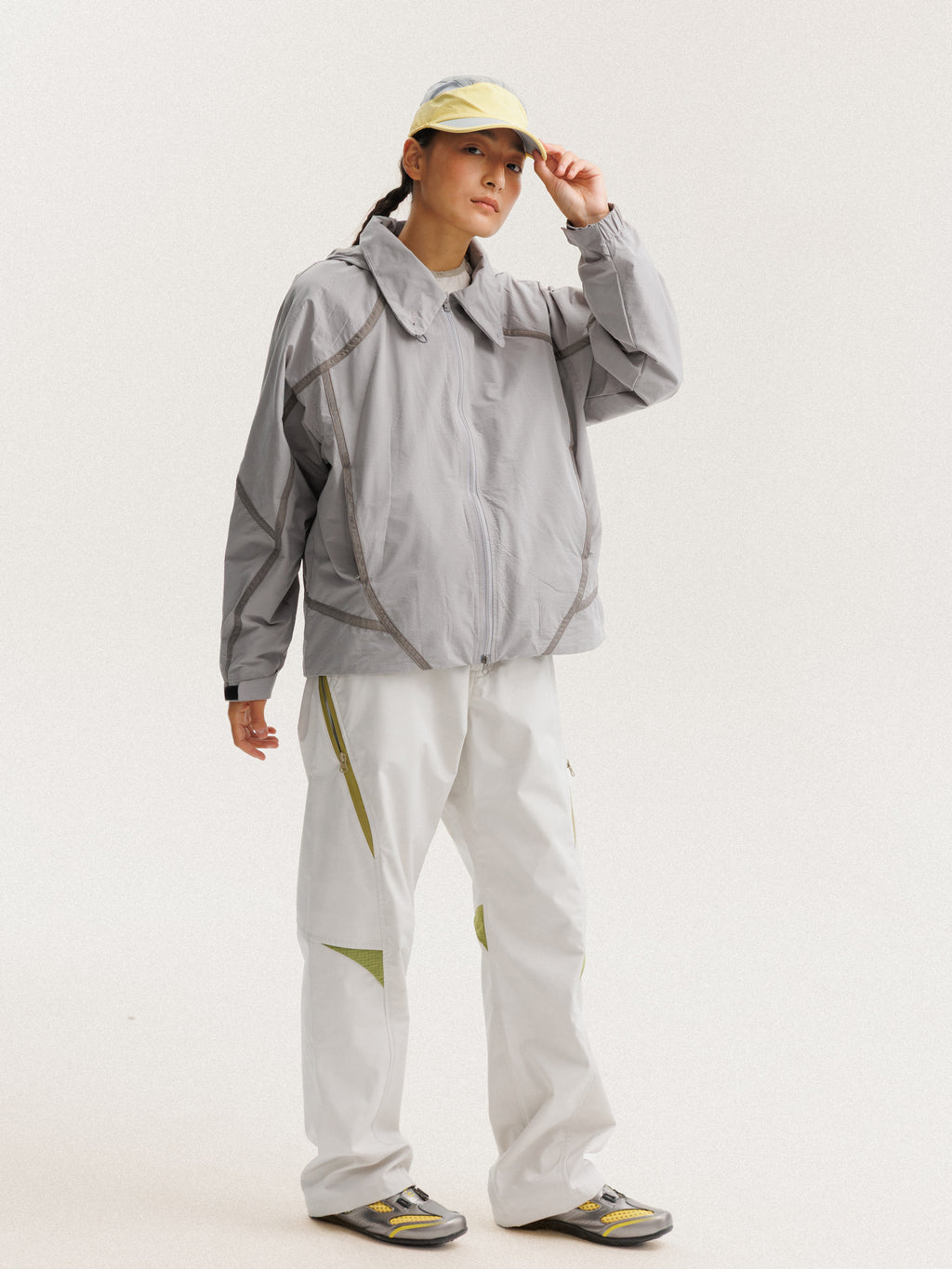 Gray jacket — front three-quarter view showing the side panels and sleeve shape