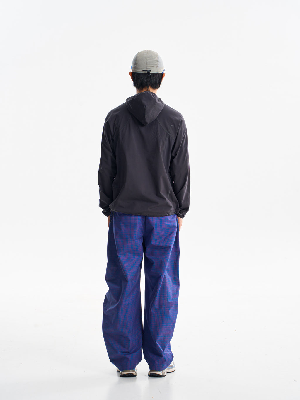 Prussian Blue hiking cargo pants — rear view showing the back pockets and leg shape