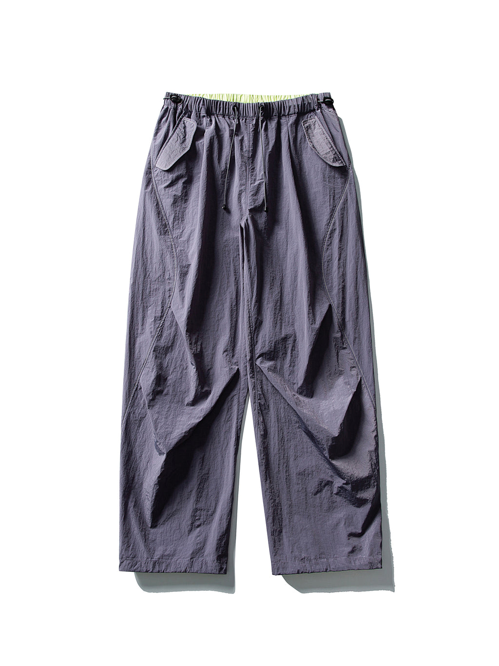 Purple hiking pants — flat front view showing the violet-grey shell and lime waist edge