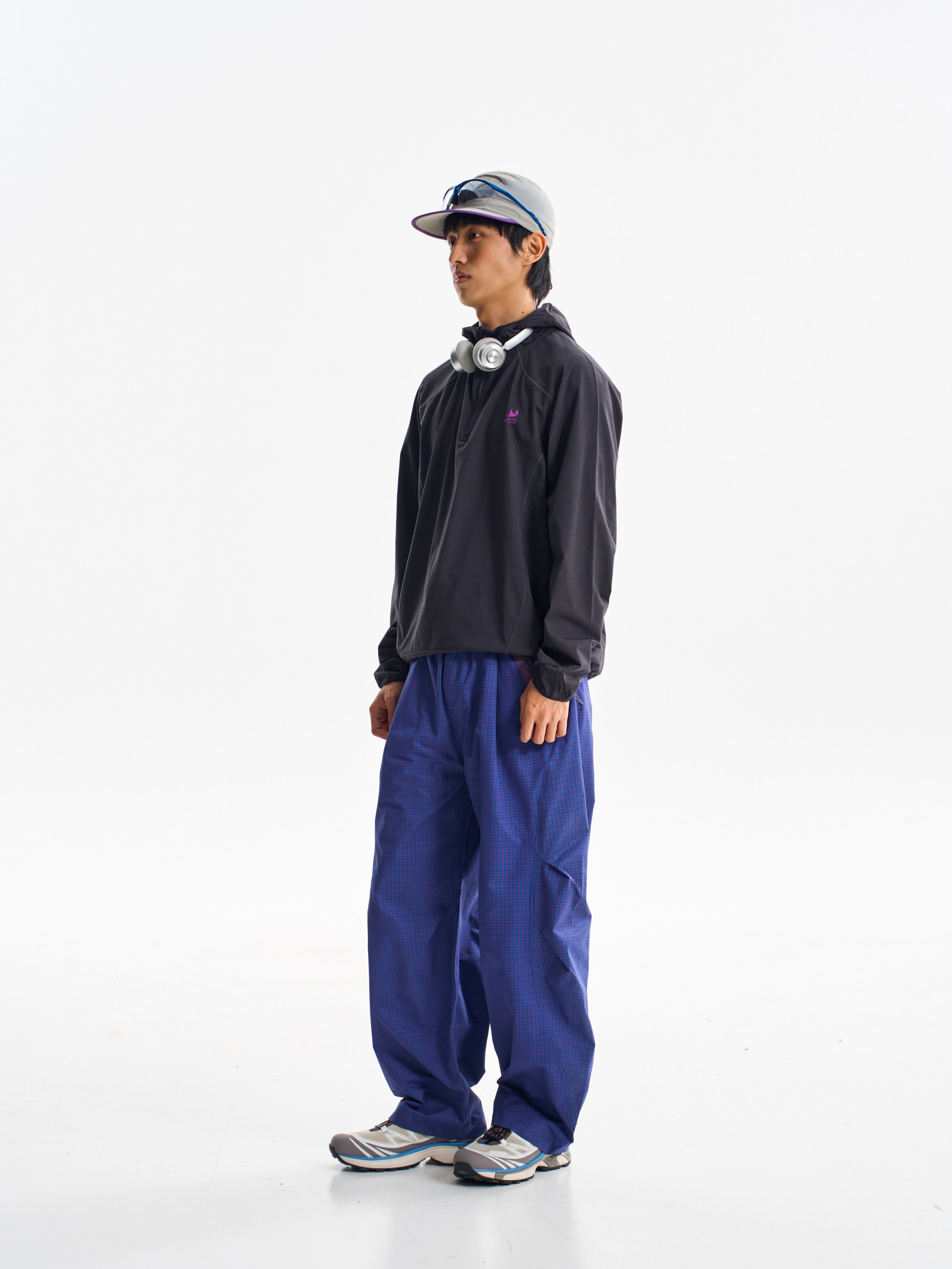 Prussian Blue hiking cargo pants — side view showing the curved leg profile