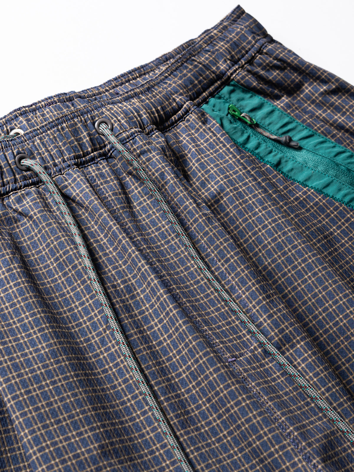 Slate Purple hiking cargo pants — elastic waistband and braided drawcord close-up