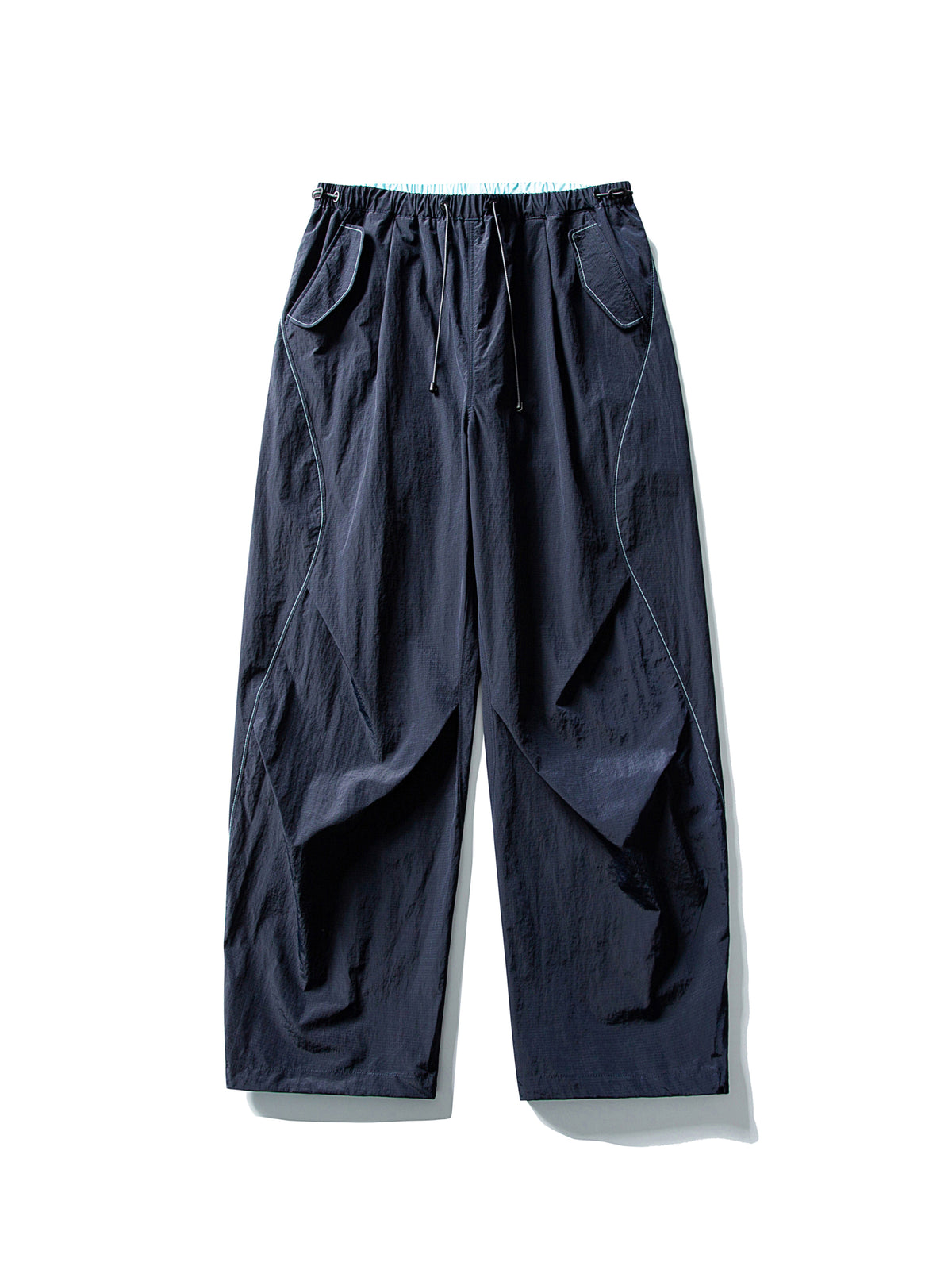 Deep Blue hiking pants — flat front view showing the dark navy shell and pale waist edge